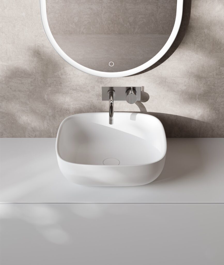 Hornbæk wash basin - Hornbæk wash basin from Copenhagen Bath with optional matching Acovi® Solid Surface drain cover for a seamless, elegant bathroom look.