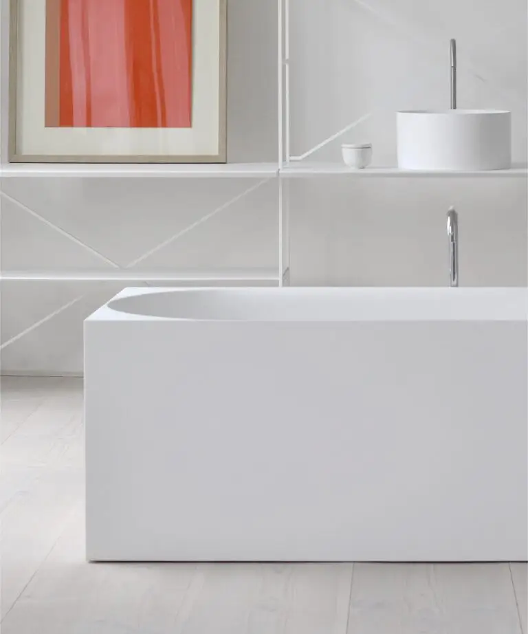 SQ1 sculptural bathtub by Copenhagen Bath with integrated chaise lounge, designed by Mikal Harrsen for modern Danish bathroom luxury.