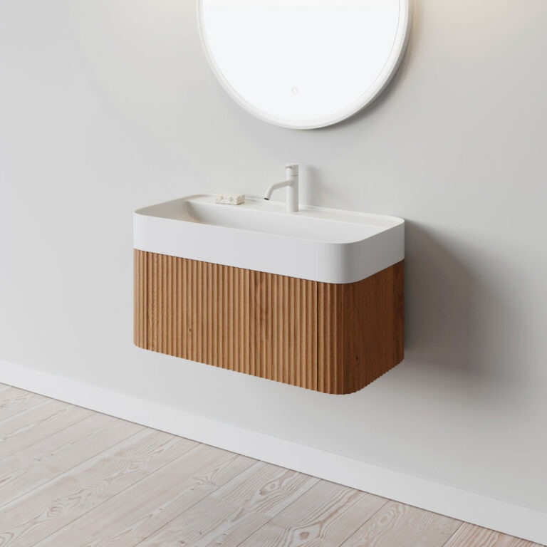 Yuno Eg 80 bathroom cabinet in solid oak with a matte white Acovi® Solid Surface wash basin on top. With oval mirror